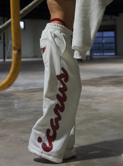 Red Crocodile Studded Sweatpants